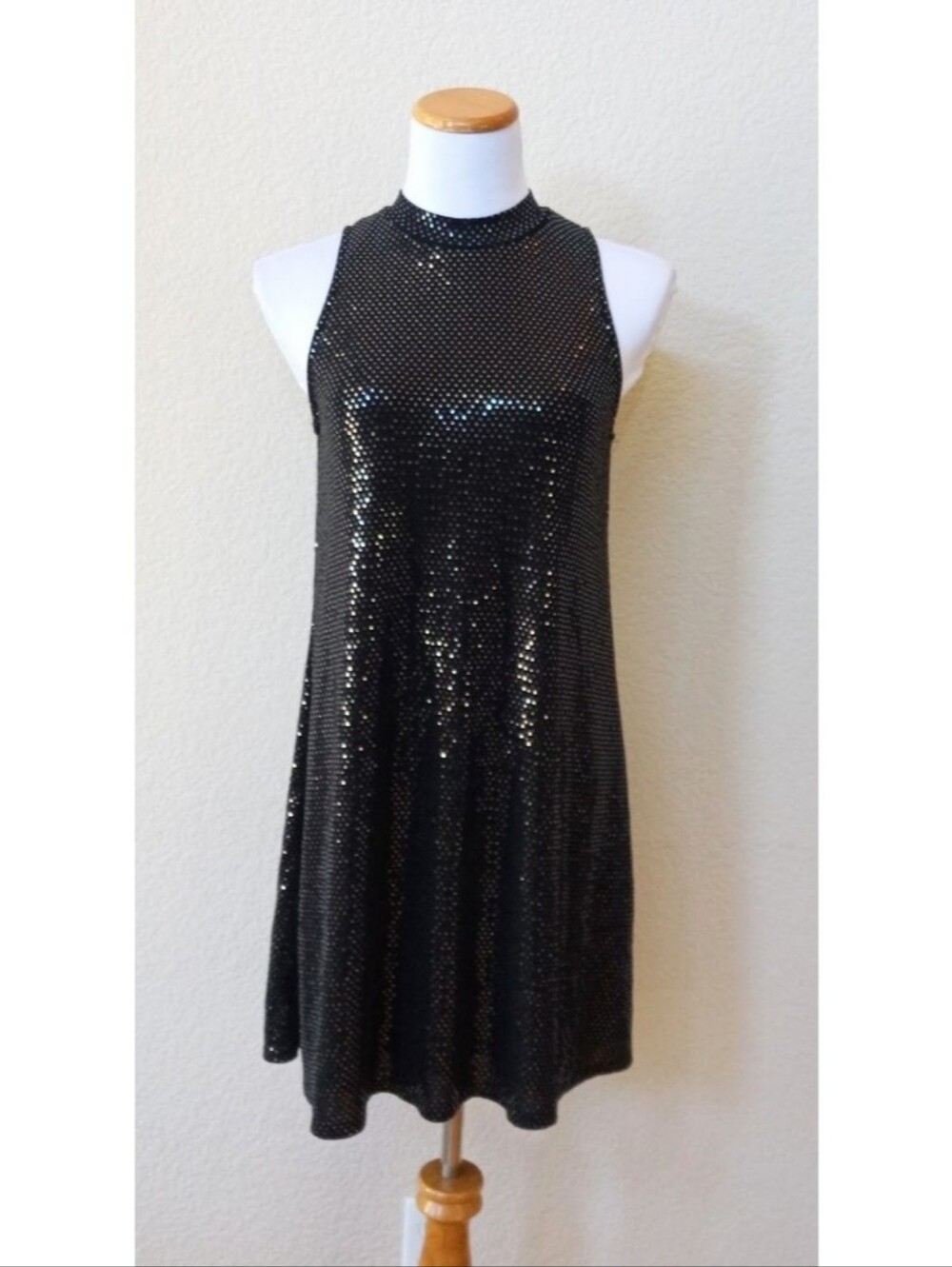 Jump Apparel vintage sparkling shimmering mini drrss with a sleek high neckline